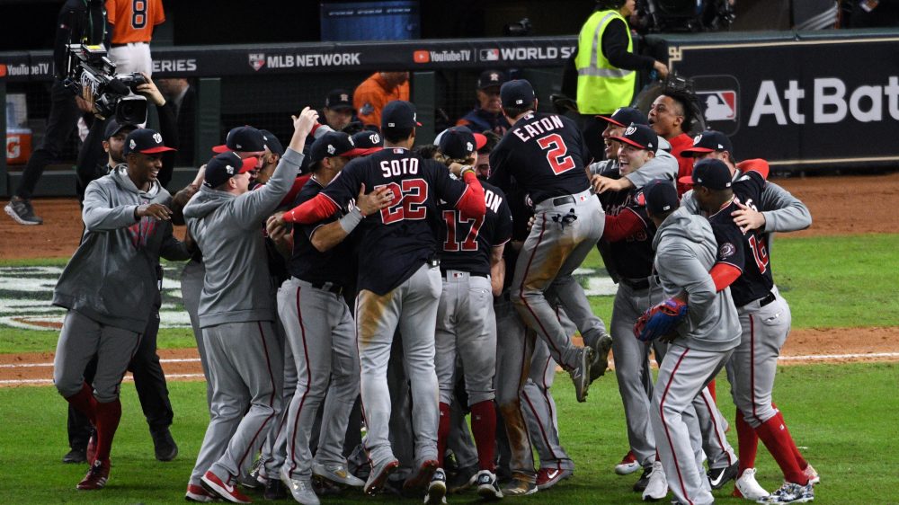 The Washington Nationals celebrate after defeating the Houston Astros in Game 7 to win the World Series at Minute Maid Park on Wednesday in Houston.