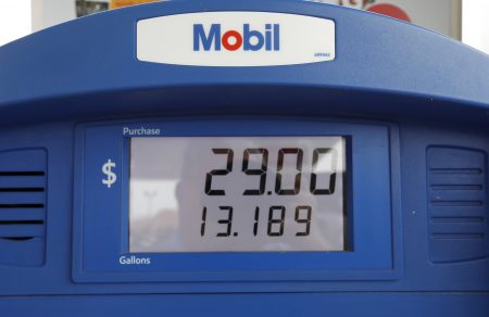 In this June 26, 2019, file photo a Mobil gas pump displays the various types of fuel and their prices at this Flowood, Miss., station. Exxon Mobil Corp. reports financial results Friday, Nov. 1.