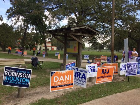 Campaign signs at the poll at Mason Community Center in Houston's East End