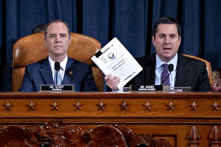 Rep. Devin Nunes, R-Calif., ranking member of the House Intelligence Committee (right), speaks as Rep. Adam Schiff, D-Calif., and chairman of the House Intelligence Committee, listens during an impeachment inquiry hearing on Capitol Hill on Nov. 21.