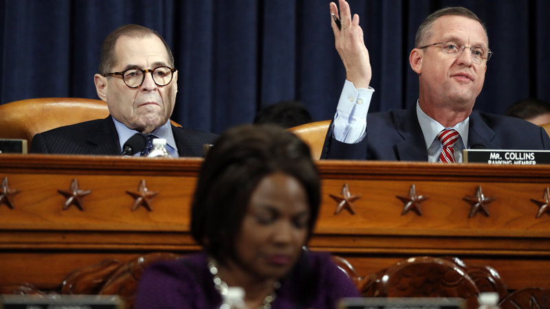 House Judiciary Committee ranking member Rep. Doug Collins, R-Ga., right, gives his opening statement during a House Judiciary Committee markup of the articles of impeachment against President Donald Trump on Wednesday. Committee Chairman Jerry Nadler, D-N.Y., left, looks on.