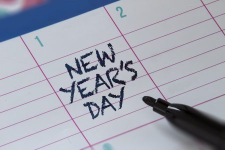 New Year's Day on a calendar with with a highlighter. January 1.