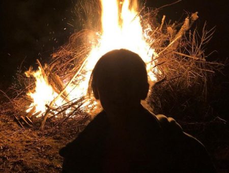 Child in Front of a Fire