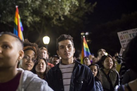 Skye Caleb Gill and other activists listen to speakers at a human rights rally at the Texas Capitol following President Trump's inauguration in 2017.