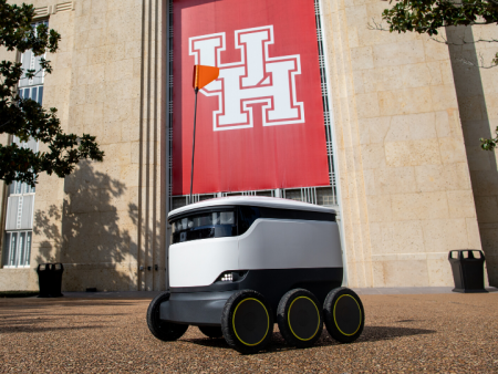 Delivery Robot in Front of UH Sign