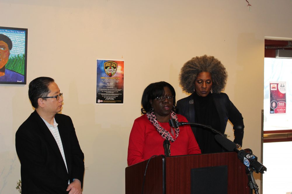 Former HPD officer Kathy Swilley talks to reporters together with Hai Bui, left, and former LAPD officer Cheryl Dorsey.