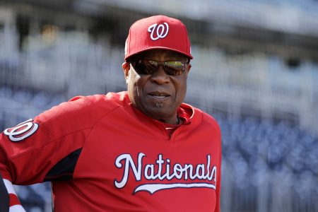 Washington Nationals manager Dusty Baker watches the team during baseball practice at Nationals Park, Wednesday, Oct. 4, 2017, in Washington. Game 1 of the National League Division Series against the Chicago Cubs is Friday. (AP Photo/Mark Tenally)
