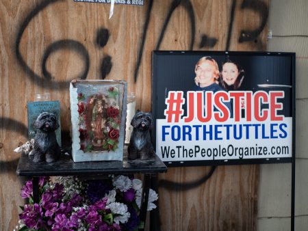 On the one year anniversary of the botched drug raid that lead to the deaths of Dennis and Rhogena Tuttle, a candle light vigil is held on the doorstep of their home. Taken on January 28, 2020.