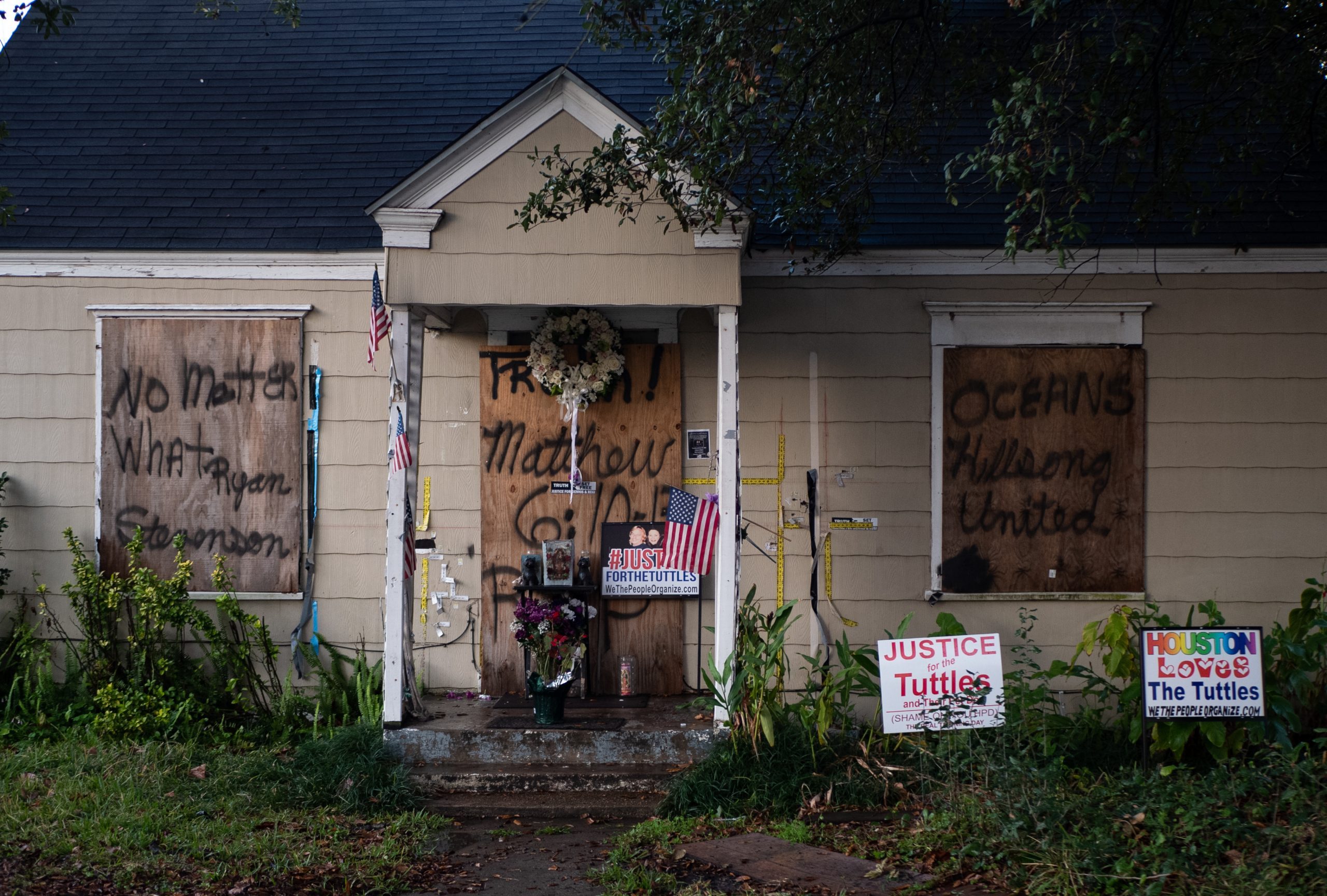 On the anniversary of the botched drug raid that led to the deaths of Dennis and Rhogena Tuttle, a candle light vigil is held on the doorstep of their home. Taken on Jan. 28, 2020. 