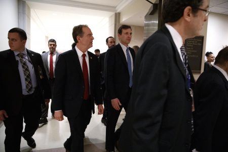 House Democratic impeachment manager Rep. Adam Schiff (second from left) leaves a news conference on Capitol Hill on Tuesday.