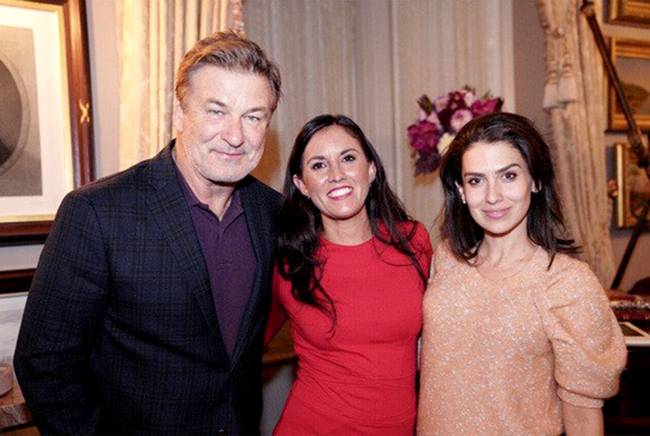 Tzintzún Ramirez poses between Baldwin and his wife, Hilaria.