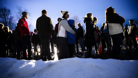 People wait in line to enter an event for Democratic presidential candidate former South Bend, Ind., Mayor Pete Buttigieg Monday.