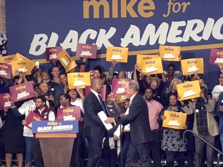 Sylvester Turner introduces presidential candidate and former New York City Mayor Michael Bloomberg at Houston’s Buffalo Soldiers Museum Thursday.