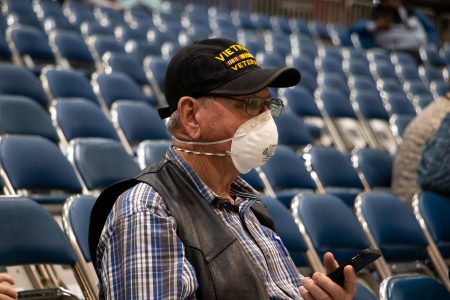 A person wears a mask at the Houston Rodeo. on March 9, 2020.