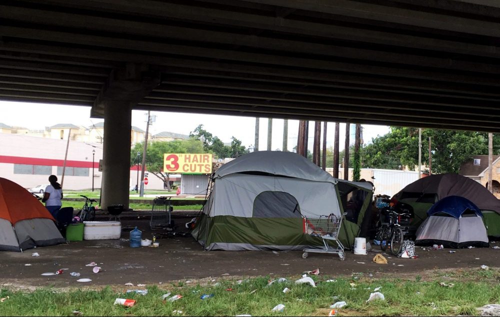 A homeless encampment beneath an I-59 overpass during Hurricane Harvey. Homeless populations are once again some of the most vulnerable as the coronavirus spreads.