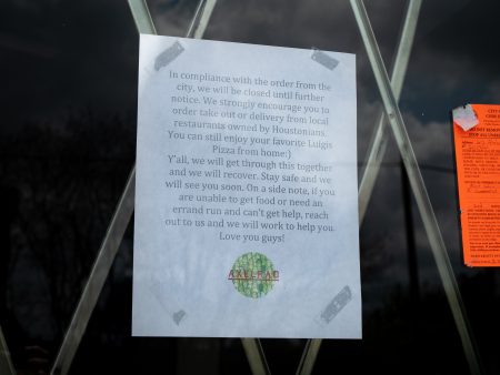 A sign on the door at the Midtown bar Axelrad, announcing its closure. Bars and Night Clubs are shutdown in an effort to stop the spread of the Coronavirus.