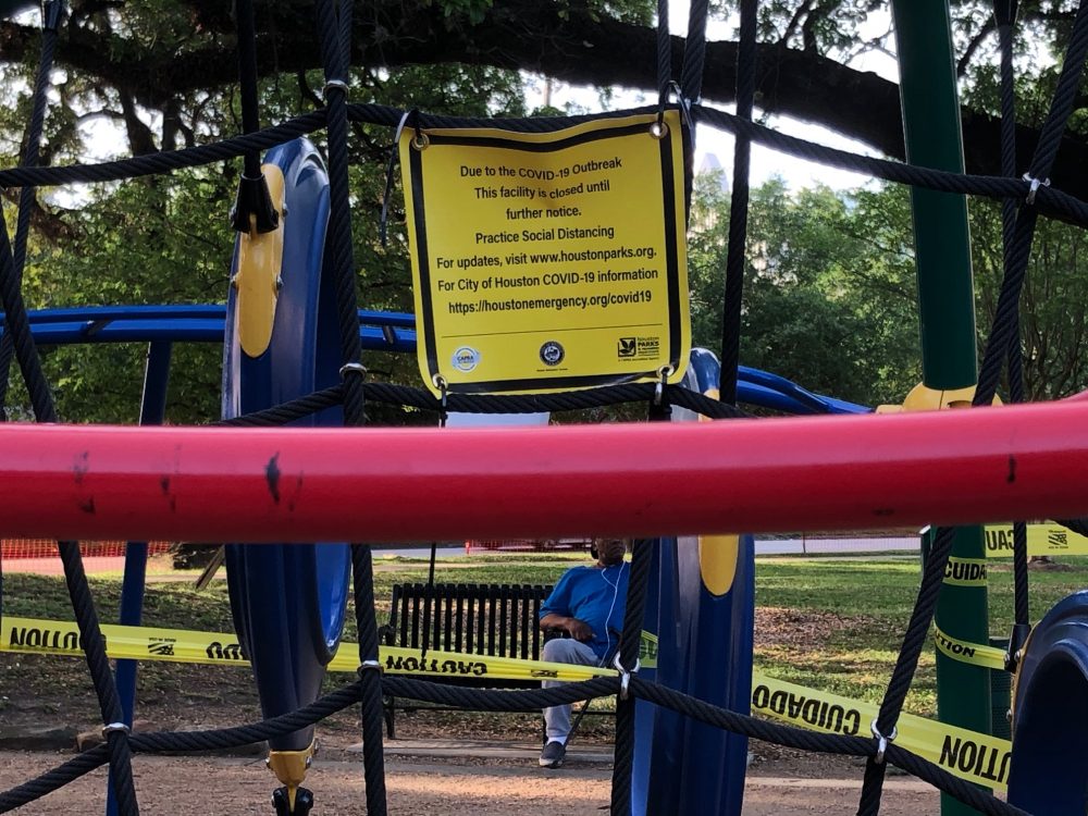 A sign warns the public to stay off playground equipment at Elizabeth Baldwin Park in Midtown. The coronavirus has caused Harris County to issue a stay-at-home order, which allows people to go out in public for exercise but bans people from touching equipment.