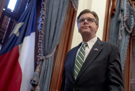 Lt. Gov. Dan Patrick exits a press conference at the state Capitol over the state's response to the coronavirus on March 31,