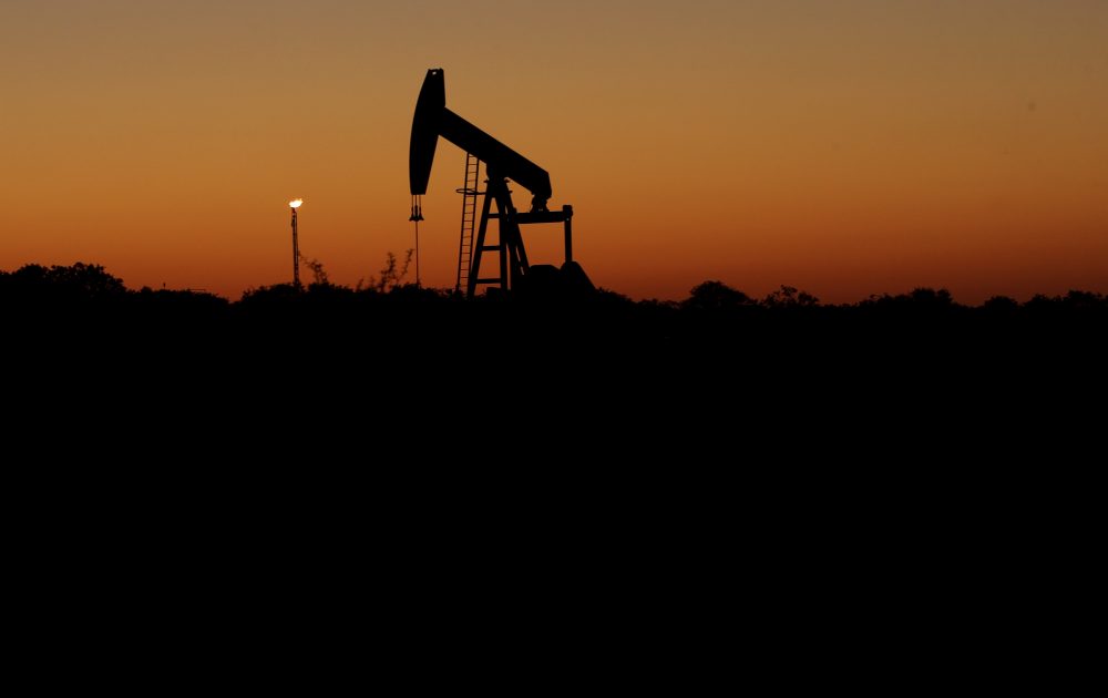 A pumpjack sits idle at sunset in Falls City, Texas, Thursday, April 23, 2020. The oil industry continues to suffer due to the ongoing COVID-19 outbreak. (AP Photo/Eric Gay)
