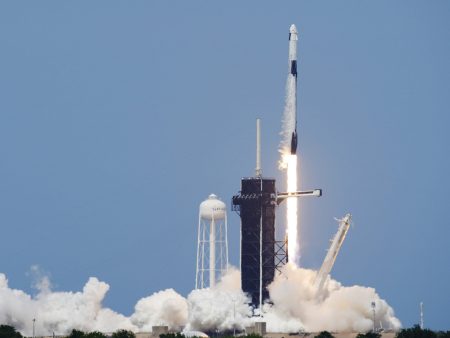 A SpaceX Falcon 9, with NASA astronauts Doug Hurley and Bob Behnken in the Dragon crew capsule, lifts off from Pad 39A at the Kennedy Space Center in Cape Canaveral, Fla., on Saturday.