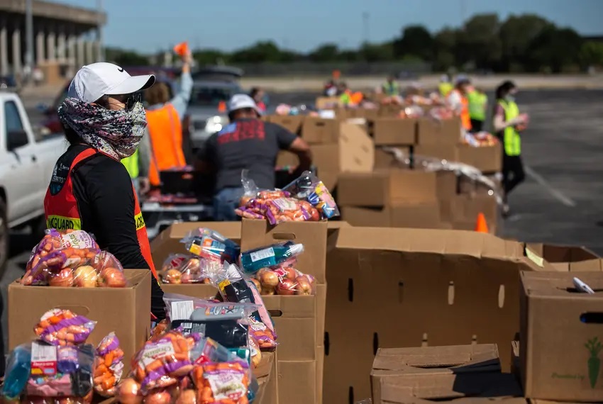 The Central Texas Food Bank hosts a food drive at the Toney Burger Activity Center in Austin on April 30, 2020.