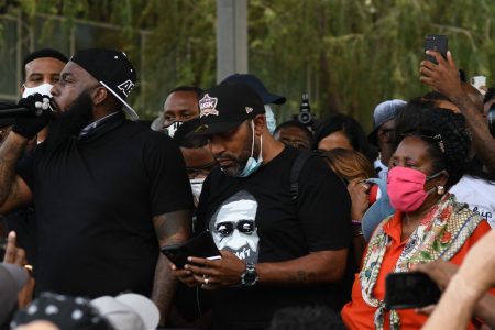 From left, rapper Trae the Truth address demonstraters as Bun B and U.S. Rep. Sheila Jackson Lee look on in downtown Houston. Tens of thousands of protesters gathered to honor the memory of George Floyd, killed last week during an arrest in Minneapolis.