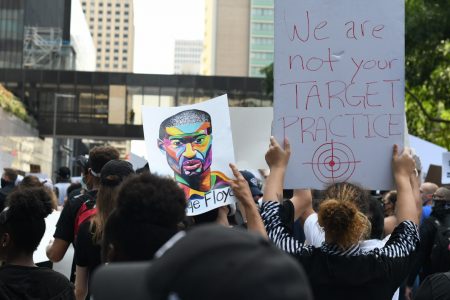 Protesters gather in downtown Houston on Tuesday, June 2, 2020, in memory of George Floyd.
