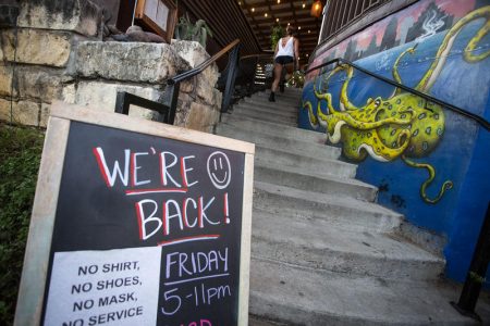 A restaurant in Austin announces its reopening, amid the gradual lifting of restrictions on Texas businesses during the COVID-19 pandemic.