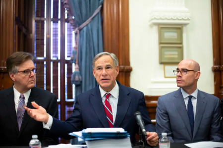 Gov. Greg Abbott along with Lt. Gov. Dan Patrick and House Speaker Dennis Bonnen, hold the first meeting of the Texas Safety Commission in 2019. On Tuesday, Abbott said lawmakers plan to craft legislation that will freeze property tax revenues in cities, like Austin, that cut police budgets.