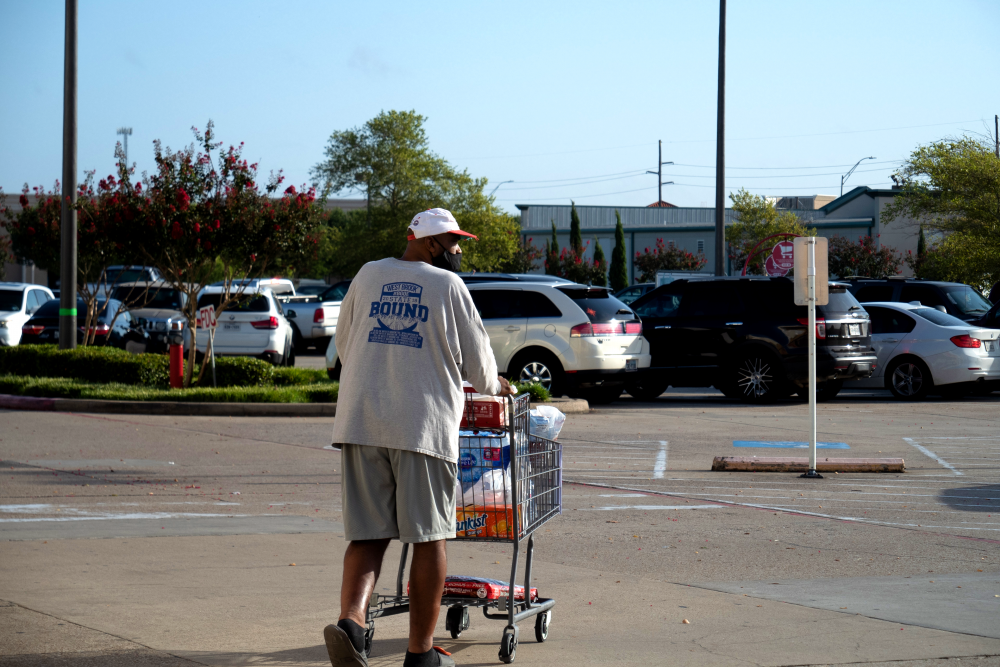 A Beaumont man leaves a local grocery store with last-minute supplies ahead of Hurricane Laura’s landfall on Aug. 26, 2020. While the city was under an evacuation order, some people stayed behind to wait out the storm.