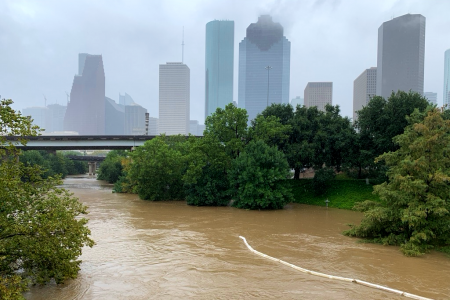 Downtown Houston can be seen over a flooded Buffalo Bayou after Tropical Depression Beta poured heavy rainfall on the area, Sept. 22, 2020.