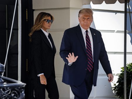 President Trump, en route to Cleveland for the first televised debate with opponent Joe Biden, departs the White House with First Lady Melania, in Washington, DC on September 29.