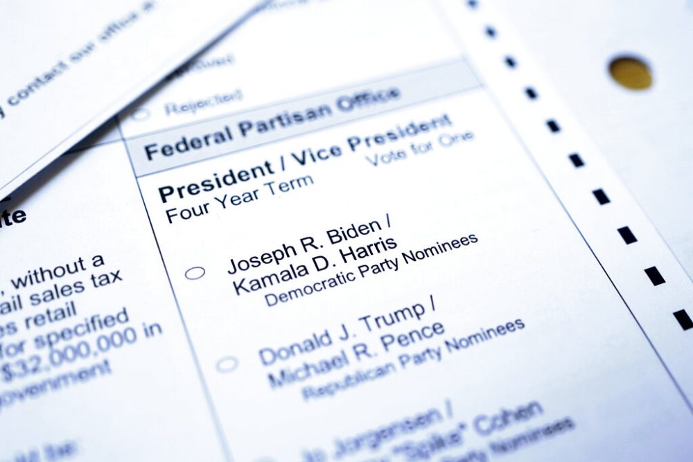 A portion of a Washington state mail-in ballot is shown with choices that include Donald Trump and Joe Biden for president, Monday, Oct. 26, 2020, in Olympia, Wash.