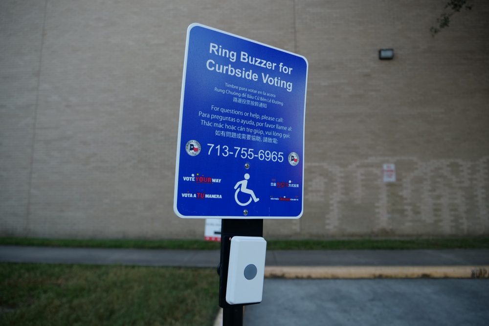 A curbside voting sign in Houston's East End on Election Day, Nov. 3, 2020.