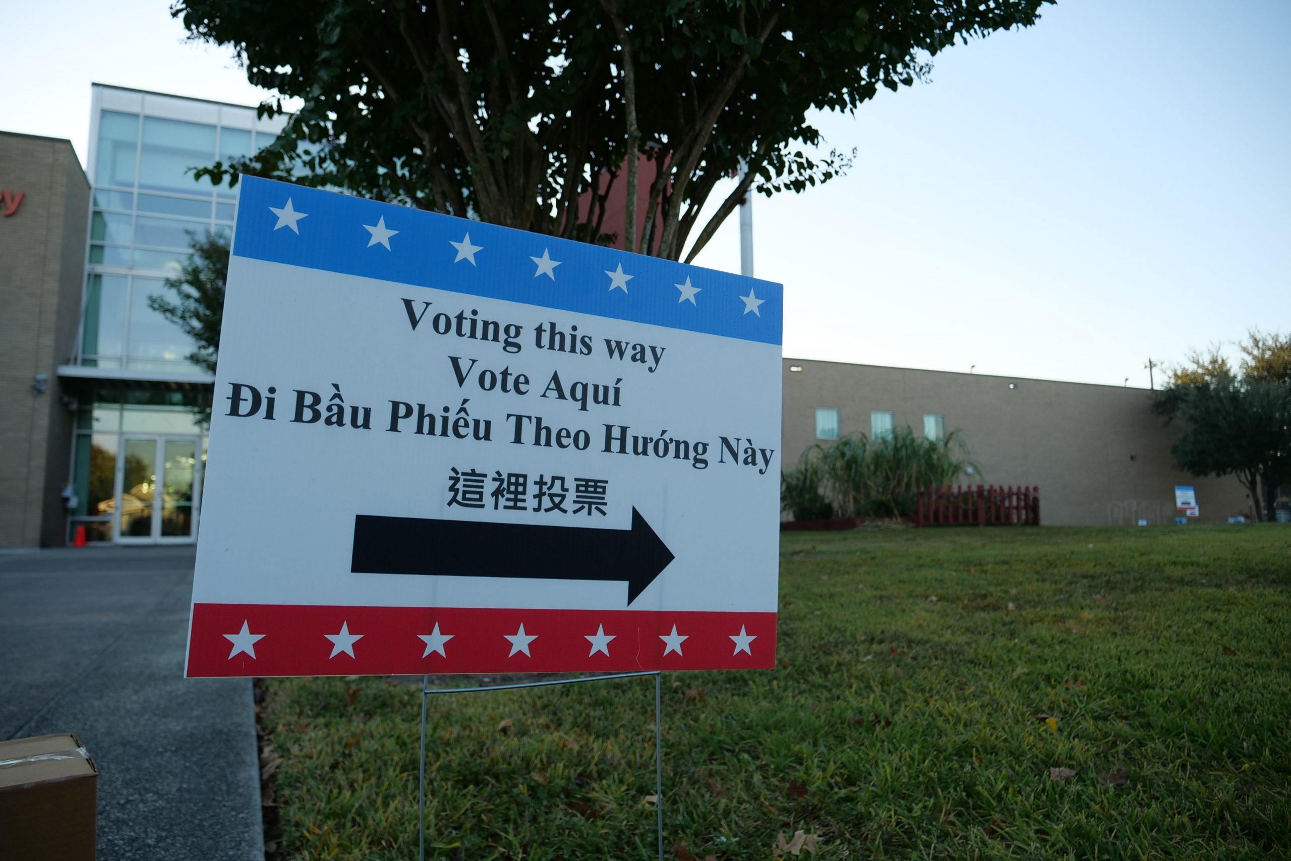 A sign pointing to voters to a polling center in Houston's East End on Election Day, Nov. 3, 2020.