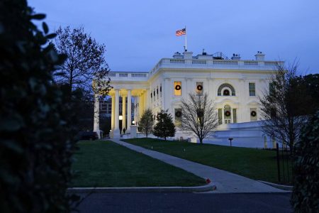 Dusk settles over the White House, Wednesday, Nov. 25, 2020, in Washington.