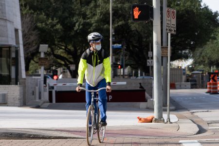 Man Rides his Bike in Houston on Jan. 5 2021.