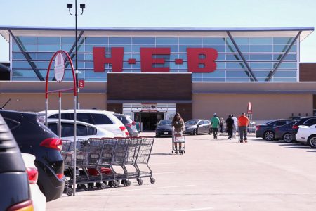 HEB shopper leaving HEB on 6055 South Fwy, Houston, on February 22, 2021.