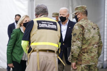 President Joe Biden and first lady Jill Biden arrive at a FEMA COVID-19 mass vaccination site at NRG Stadium, Friday, Feb. 26, 2021, in Houston.