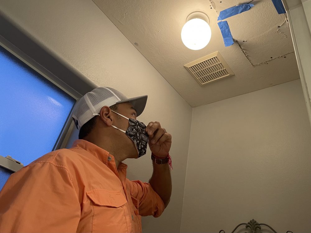 Houston plumber Eduardo Dolande shows where pipes burst inside his own home during the Texas freeze. 