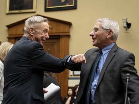 Before there were masks, there were elbow bumps. Rep. Stephen Lynch, D-Mass., and Dr. Anthony Fauci greet each other before a House Oversight And Reform Committee hearing on March 11, 2020.