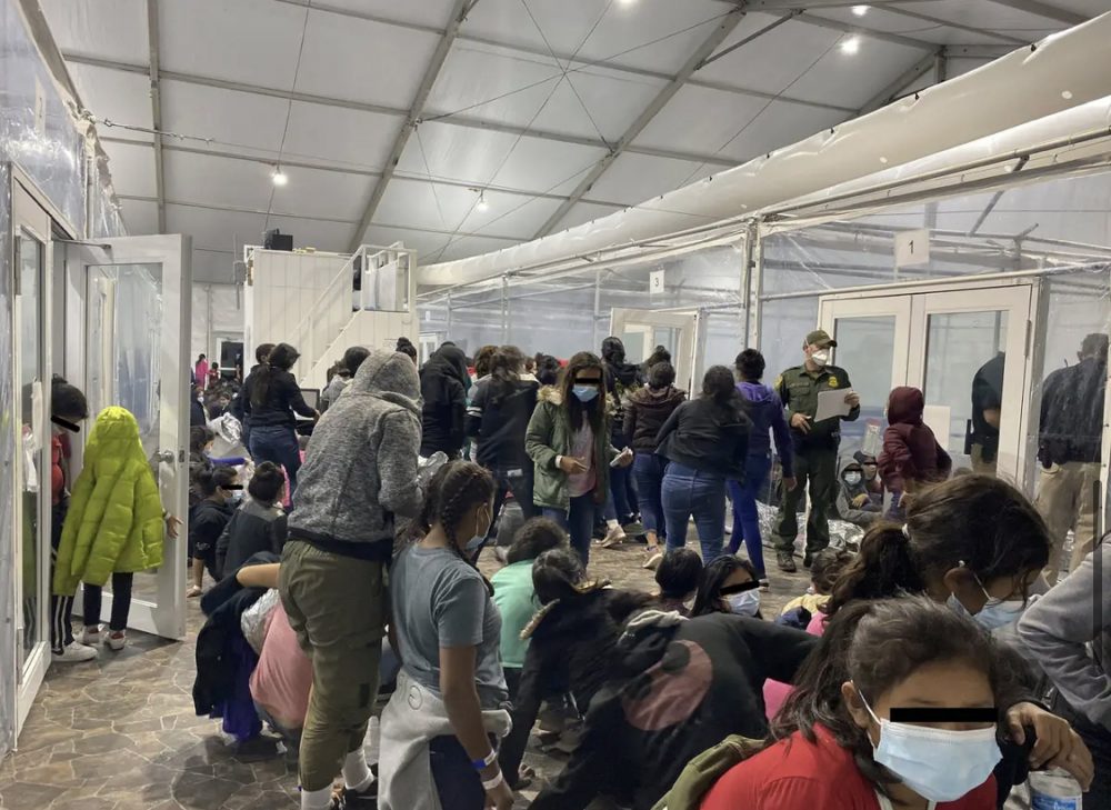 Photos from the Customs and Border Patrol temporary overflow facility in Donna.