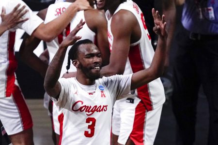 Houston guard DeJon Jarreau (3) celebrates after an Elite 8 game in the NCAA men's college basketball tournament at Lucas Oil Stadium, Monday, March 29, 2021, in Indianapolis.