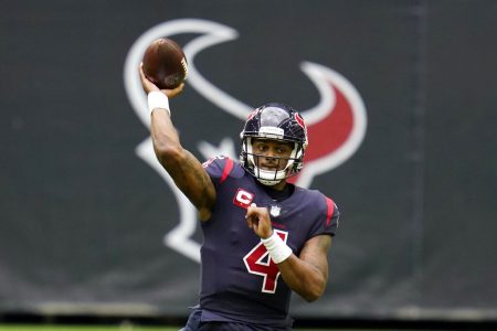 In this Dec. 27, 2020, file photo, Houston Texans quarterback Deshaun Watson throws a pass during an NFL football game against the Cincinnati Bengals in Houston. New Houston Texans coach David Culley reiterated Thursday, March 11, 2021, that the team has no intention of trading Watson, despite the star quarterback’s request to be dealt.