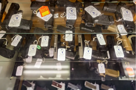 Hundreds of handguns and rifles for sale at McBride’s Gun’s in Central Austin this month.