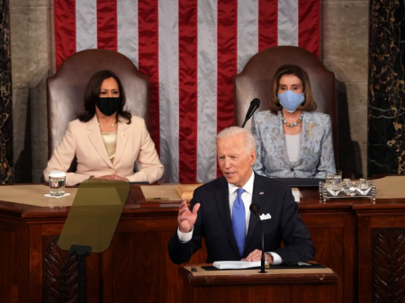 President Biden speaks to a joint session of Congress on Wednesday in the House Chamber at the U.S. Capitol, as Vice President Harris and House Speaker Nancy Pelosi watch.