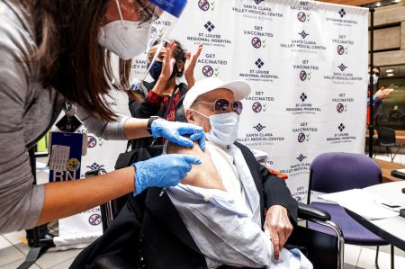 Ton Tran, who is 106-years-old, receives his second dose of the Pfizer COVID-19 vaccine at a clinic operated by Santa Clara Valley Medical Center on Thursday, May 6, 2021, in San Jose, Calif.