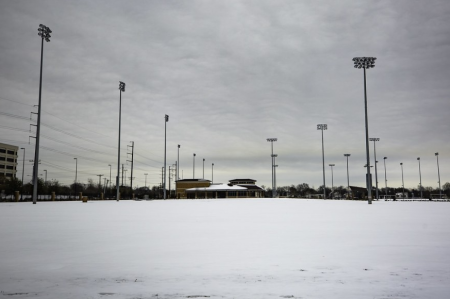 Snow covers an intramural field in the North Loop neighborhood of Austin after February's winter storm.