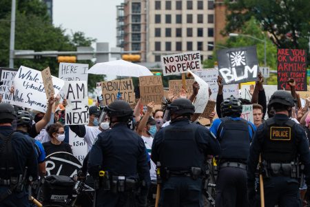 Police and protesters in Austin after the murder of George Floyd in Minneapolis last May.