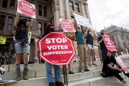 Voting rights activists gather during a protest against Texas legislators who are advancing new voting restrictions in Austin, Texas, U.S., May 8, 2021.